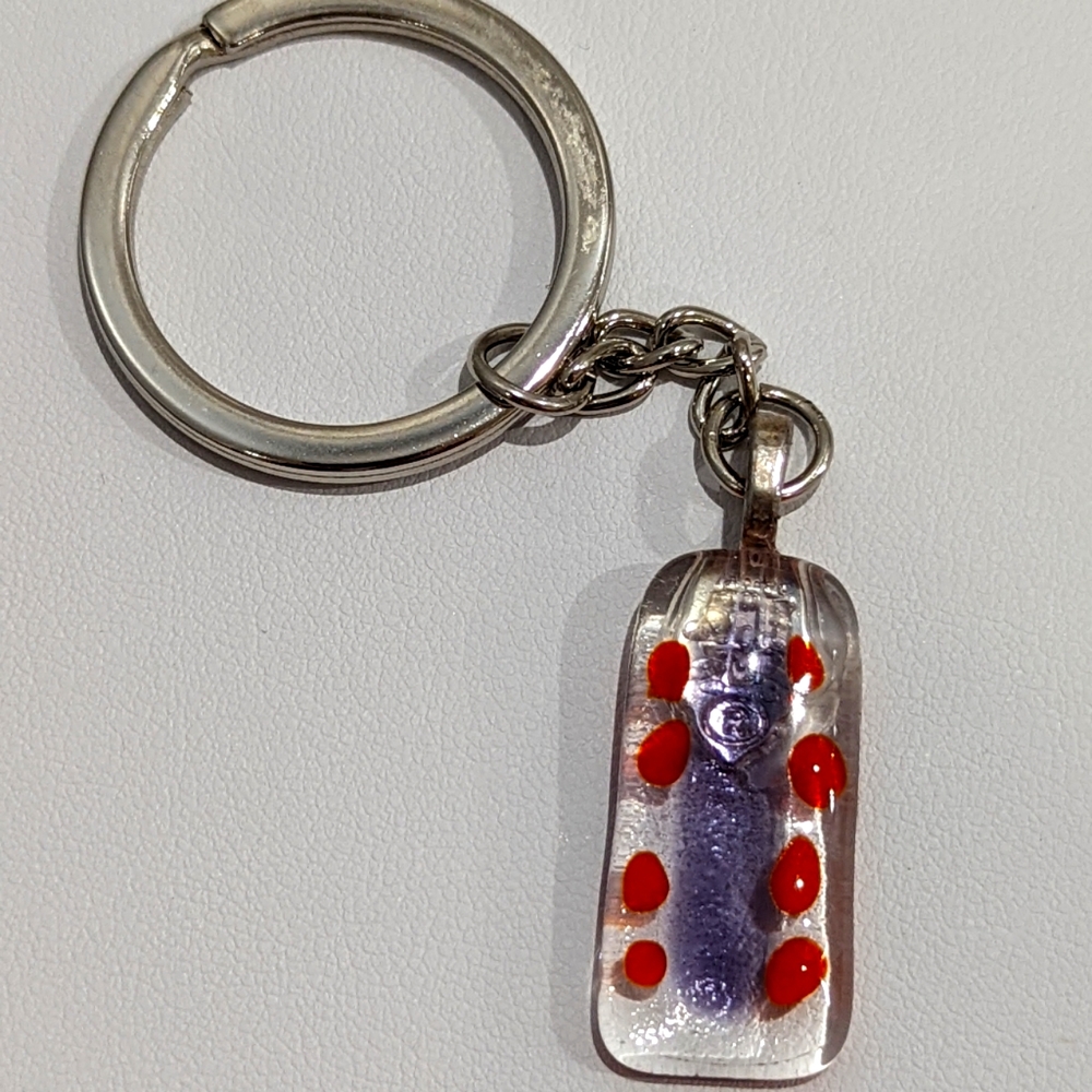Artisan Handmade  glass bag charmkeychain with purple and orange abstract design